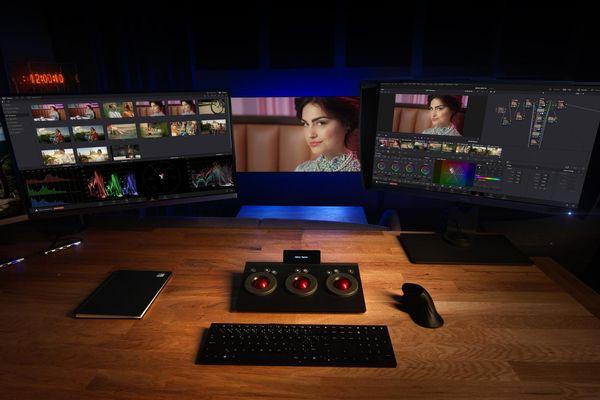 Professional editor performing colour grading and post-production on a 4K commercial video project in Kenya.