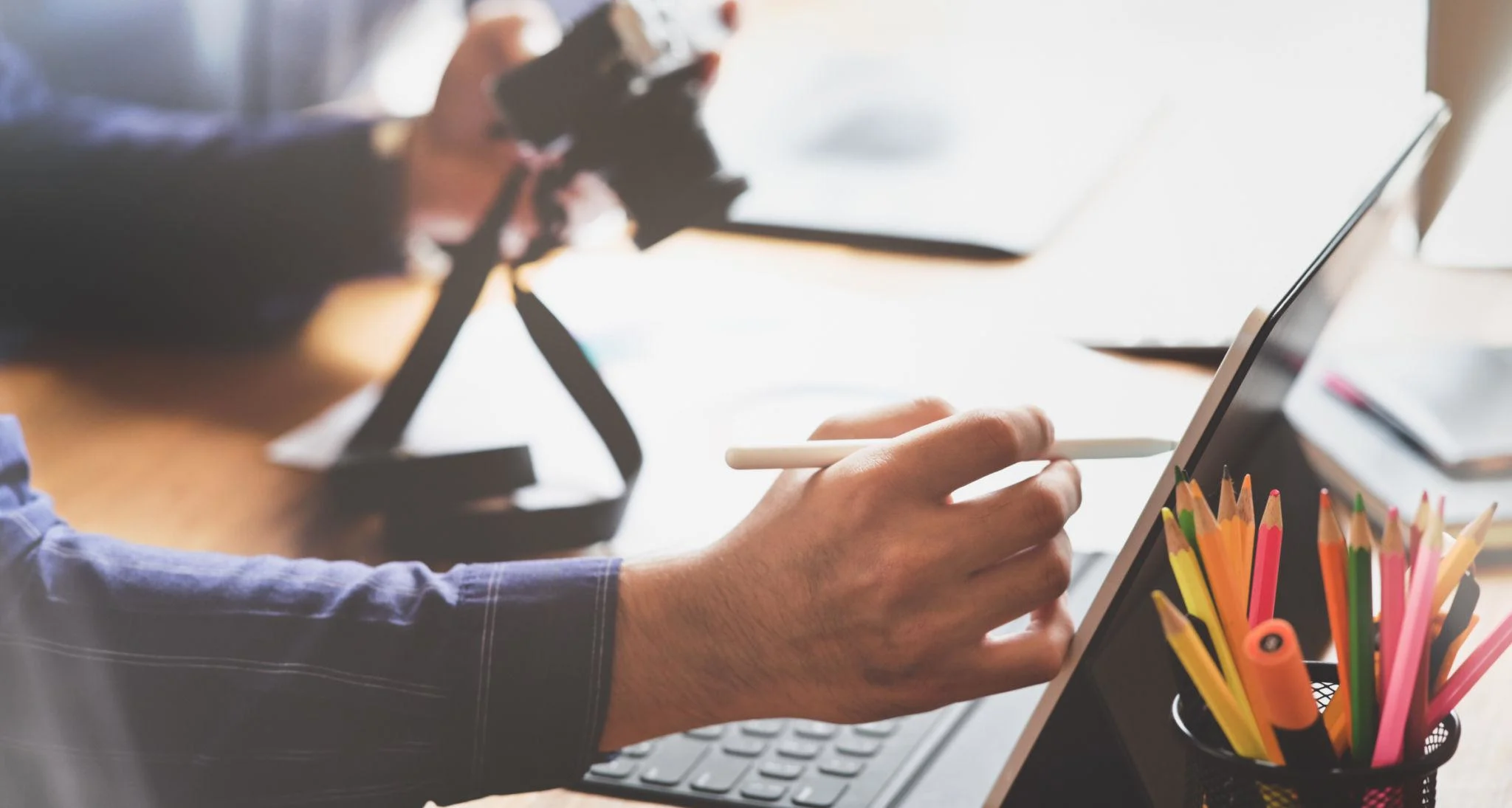 Image of a photographer taking photography notes