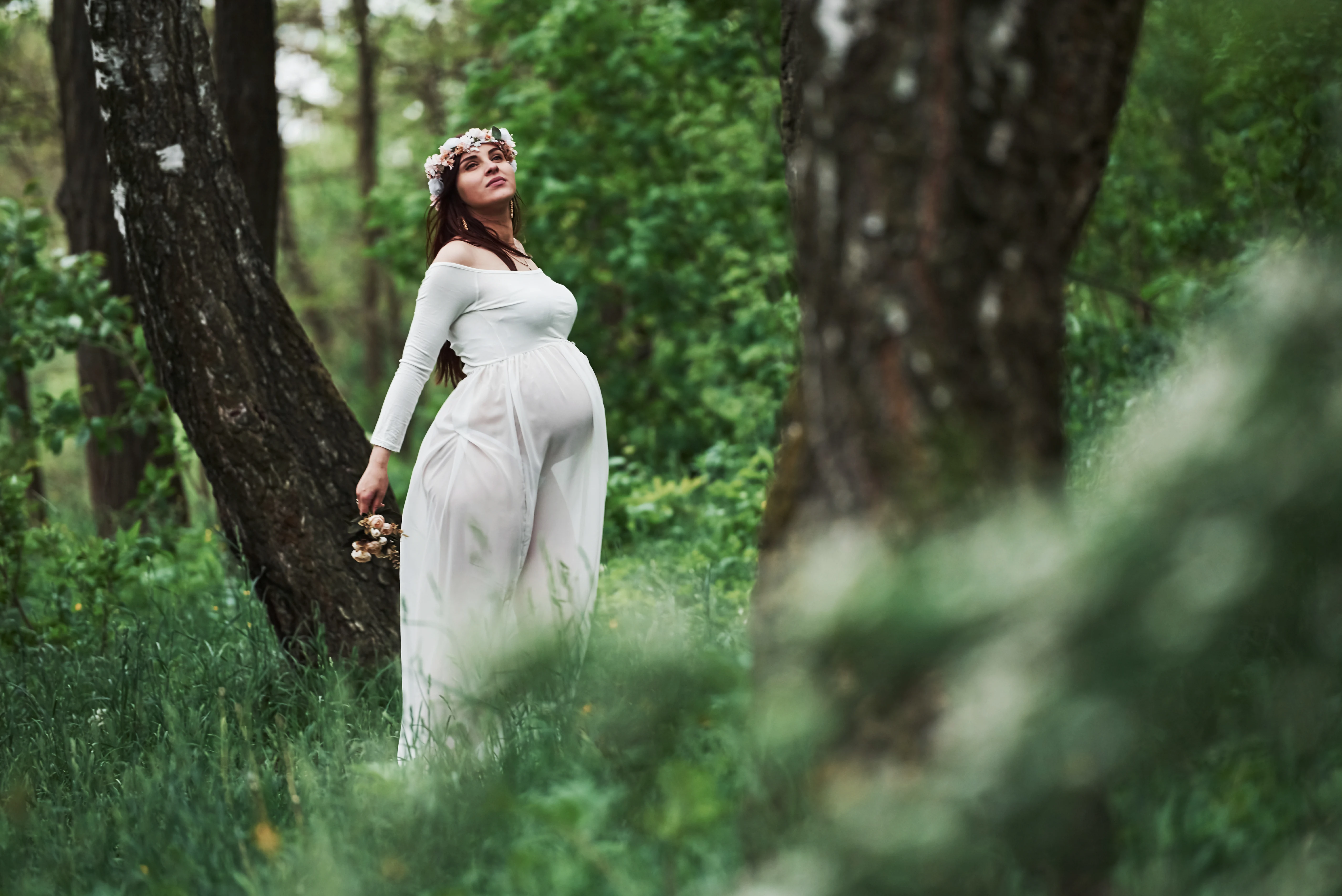 Pregnant woman posing during a professional outdoor maternity photoshoot in Kenya