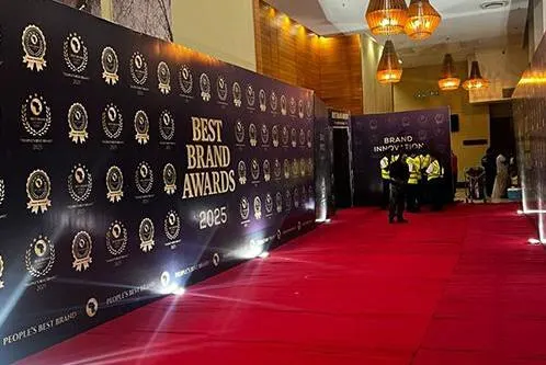 Strategically positioned media wall at a Nairobi event venue entrance
