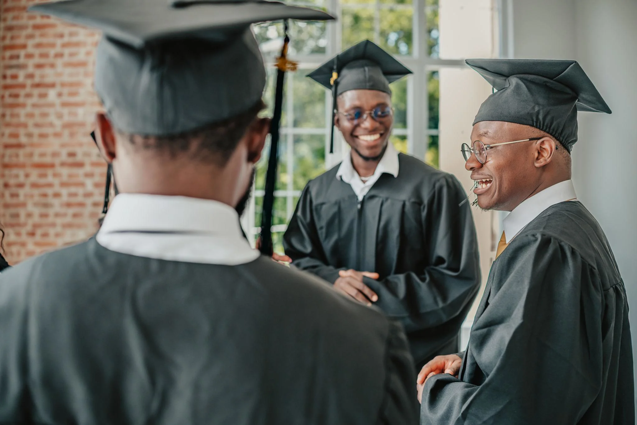 Professional graduation photography session in Nairobi featuring a university graduate in cap and gown