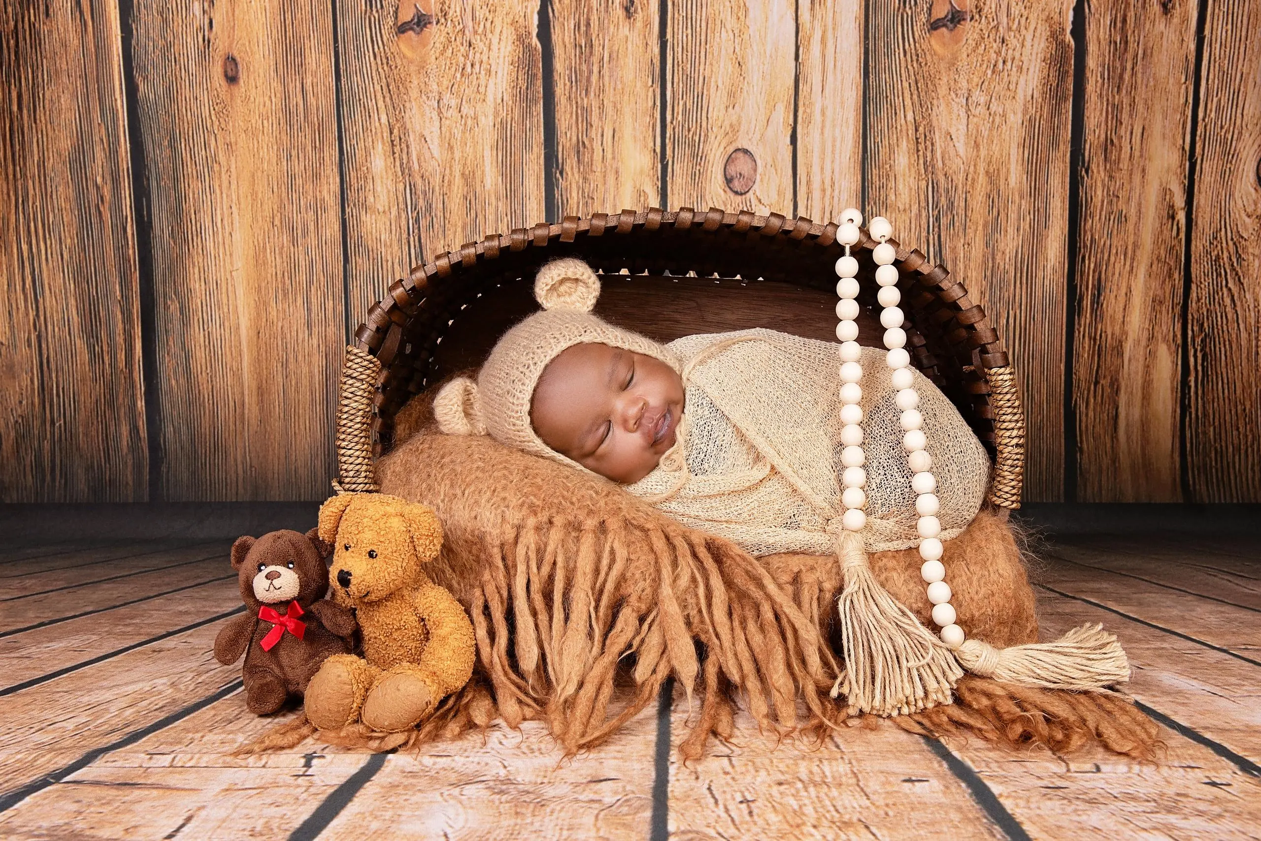 Newborn in a potato sack wrap