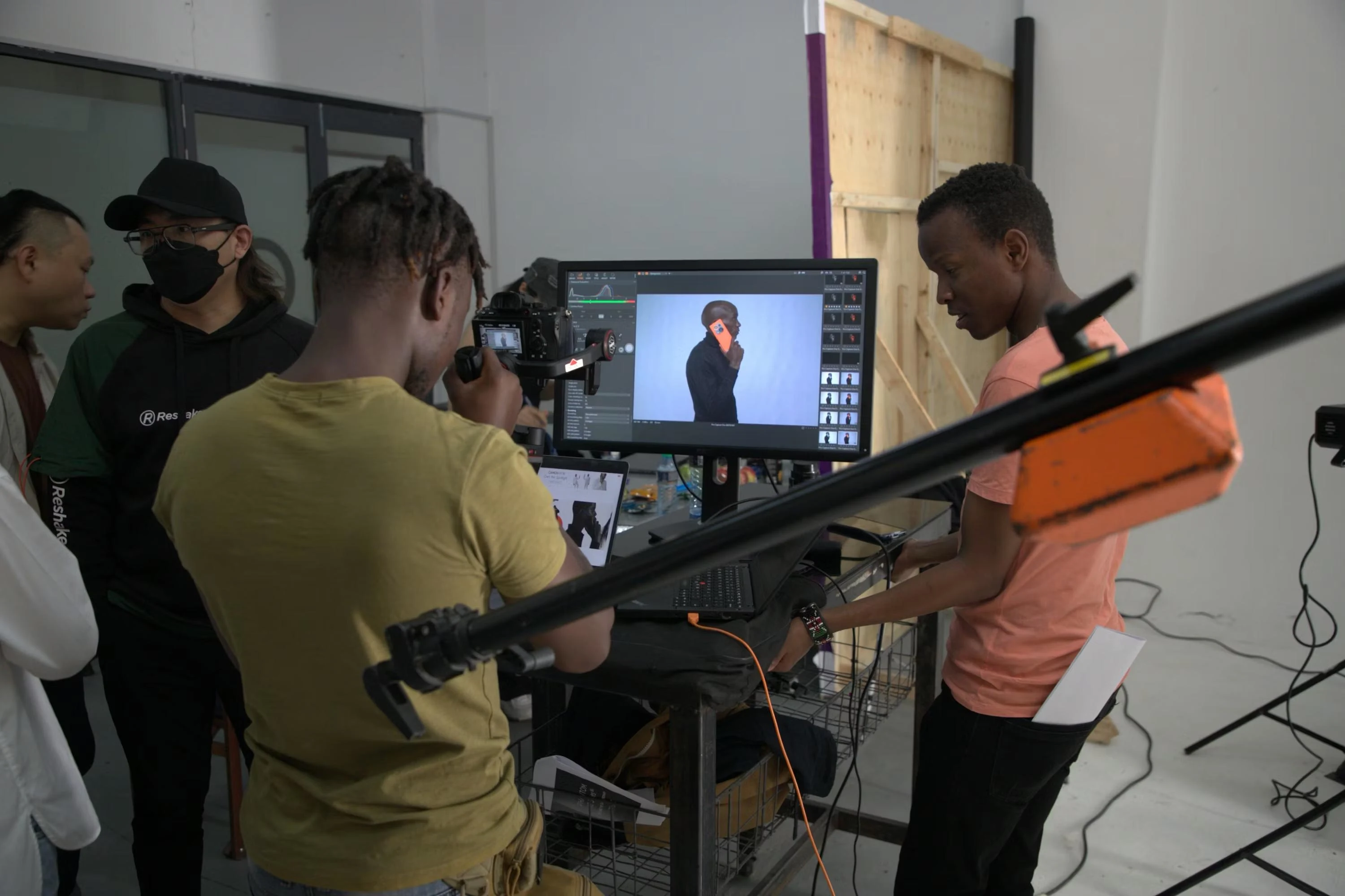 Photography production crew preparing equipment for event coverage