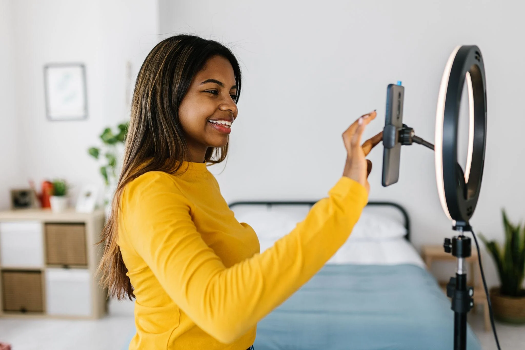 Videographer producing vertical social media video content.